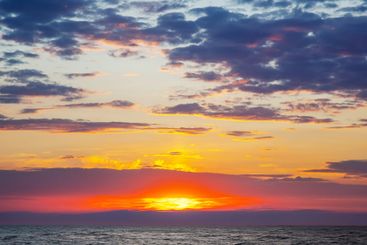 the expressive contrast of the clouds in the sky and...