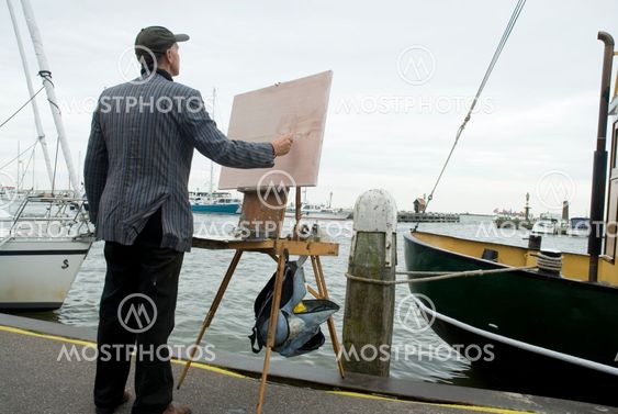 painter in harbor
