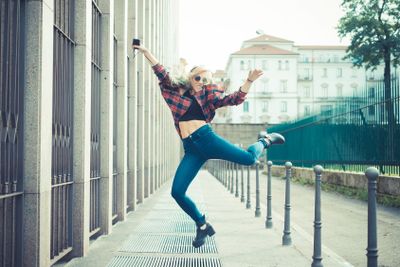 beautiful young blonde hair woman hipster listening music