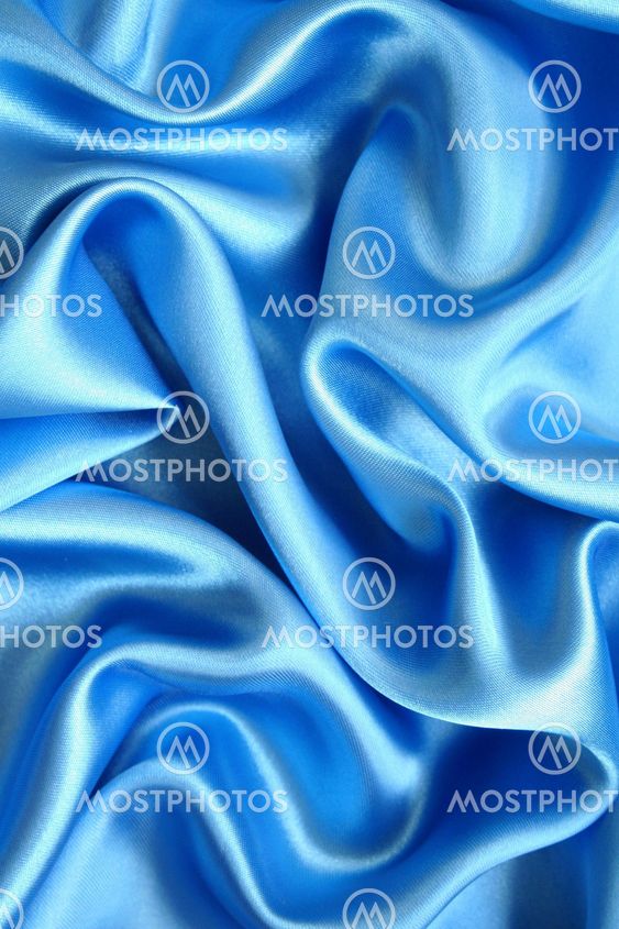 Smooth elegant blue silk as background
