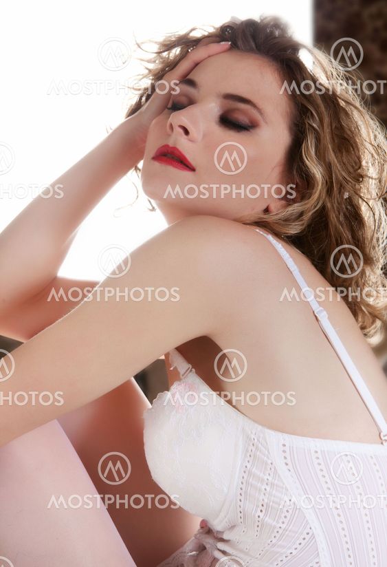 Young beautiful woman in white