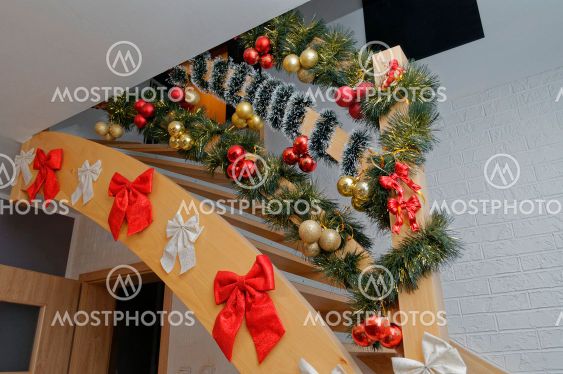 stairs in the house decorated for the holidays