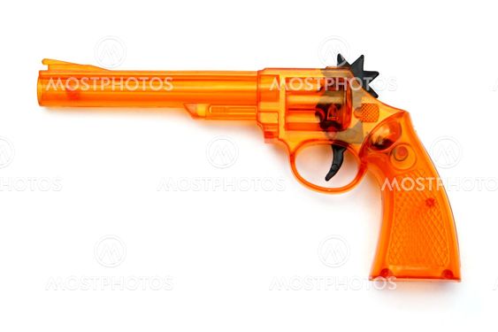 Toy plastic gun , on a white background