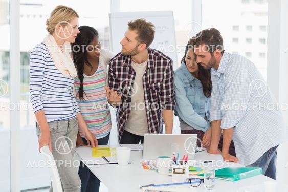 Focused team of designers having a meeting