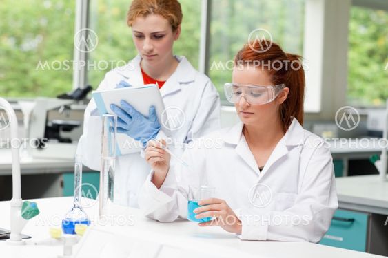 Science students doing an experiment