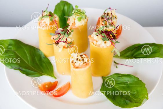 appetizer - cheese rolls with meat and vegetables