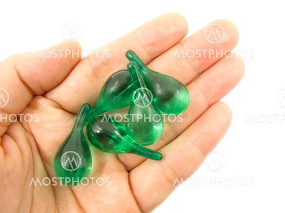 Hair vitamin serum capsule on hand