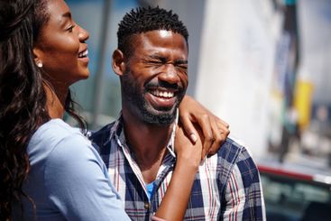 Love, laughing and couple in city together for travel...