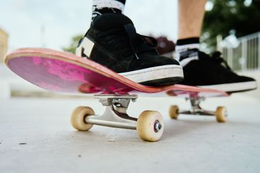 Close-Up of Skateboarder's Feet on Skateboard