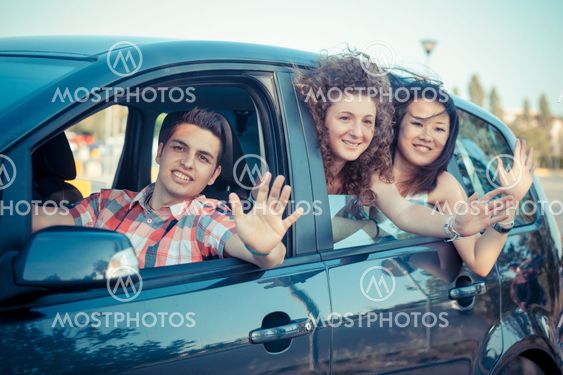 Boys and Girls in a Car Leaving for Vacation