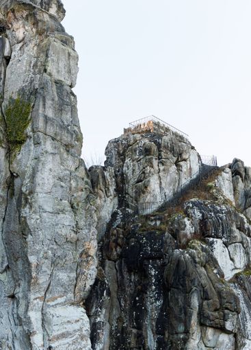 Large rocky rocks. Rocks of rocks. Gray moss-covered rocks