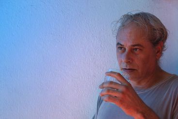 close-up with copy space of mature man with ambient...