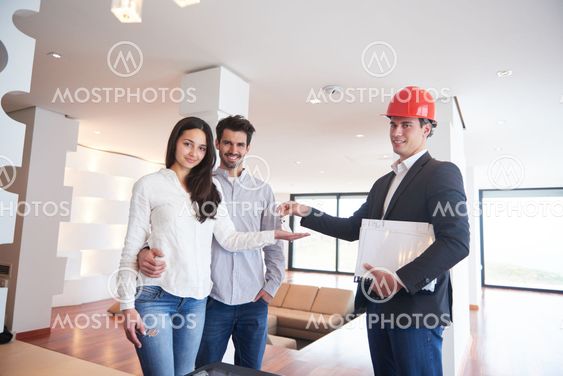 couple buying new home with real estate agent