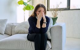 Mature sad woman experiencing stress, mental and physical...