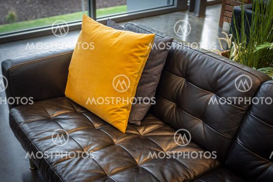 "Pillows on black leather co..." by Greg Brave - Mostphotos
