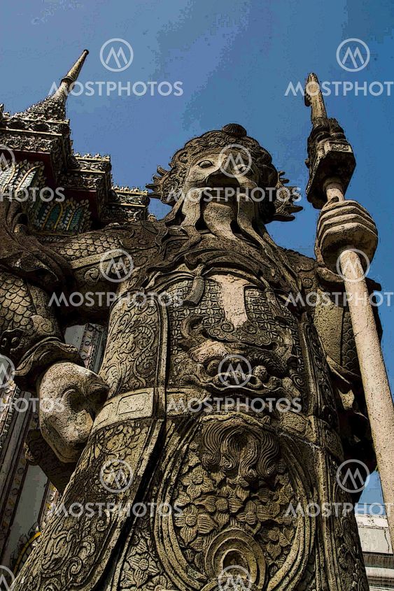 Statue of Man at Wat Pho in Bangkok Thailand