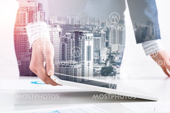 Businesswoman standing near office desk