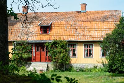 Old yellow wooden house on the island of Öland