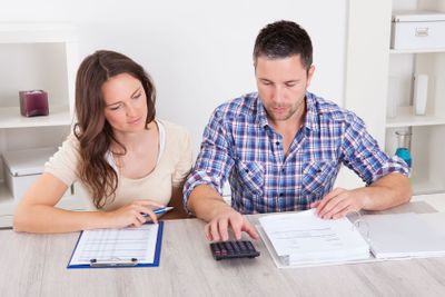 Couple Calculating Bills