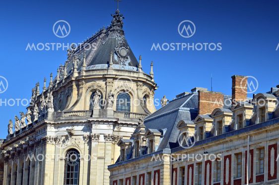 Ornamented buildings of the Royal Chapel in front of the Palace of Versailles, France