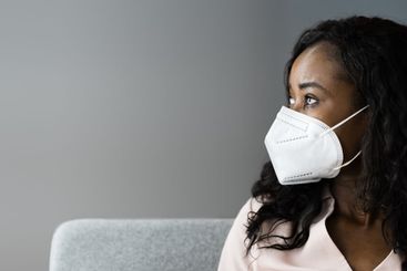 Woman On Coronavirus Quarantine In Protective Mask
