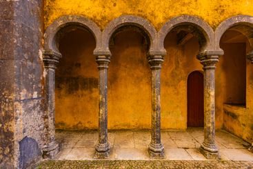Vibrant yellow walls and arches create a stunning detail...