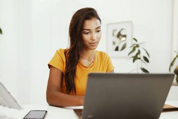 Remote work, idea and laptop with woman typing in home...