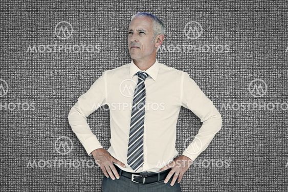 Composite image of thinking businessman