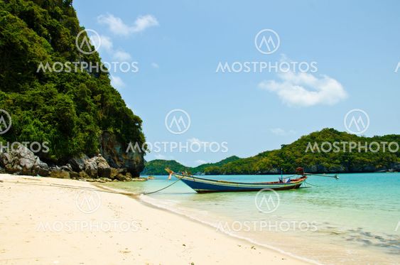 Long tail boat on the beach