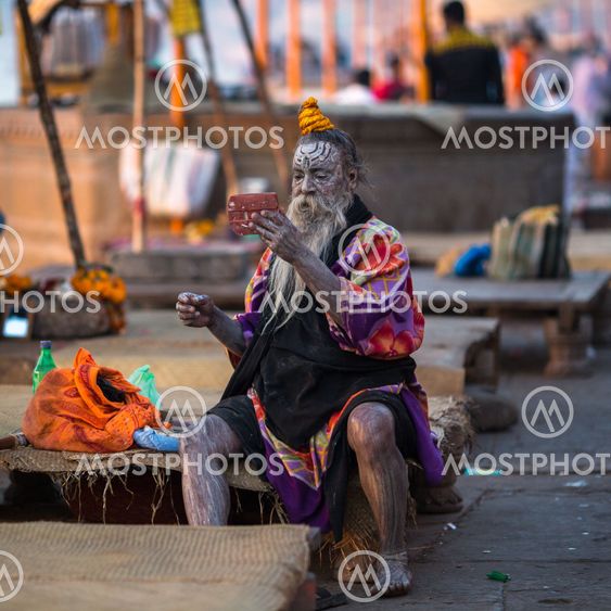 Sadhu or Baba (holy man) on the ghats of Ganges river.