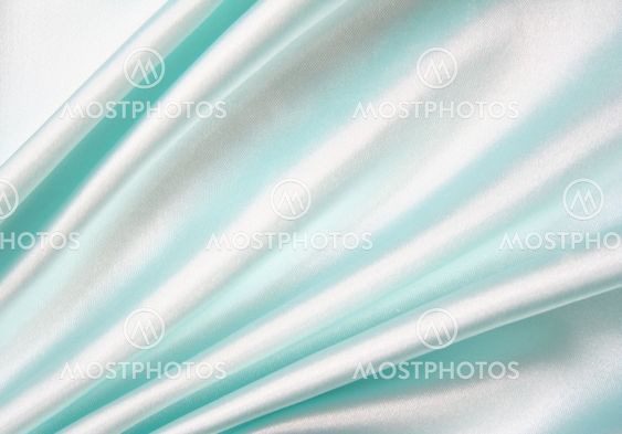 Smooth elegant blue silk as background