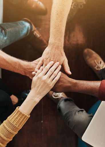 Hands together, cooperation and above in meeting,...