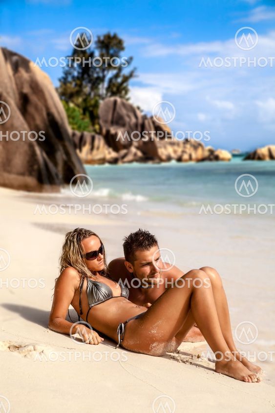 Young couple enjoying the beach