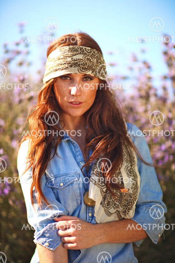 Beautiful Woman on a Field in Summertime