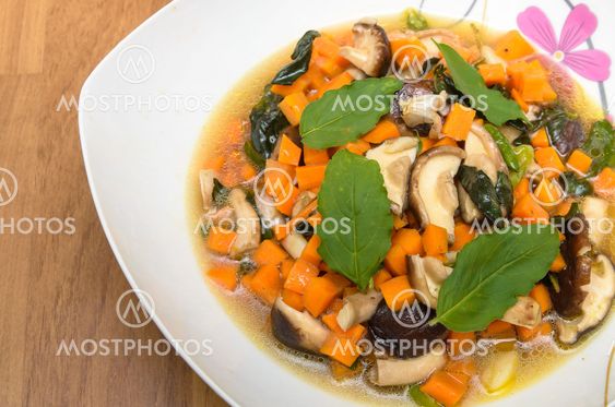 Fried shiitake mushroom and carrot in holy basil