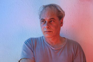 portrait with copy space of mature man with ambient...