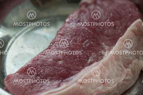 Raw uncooked beef steak