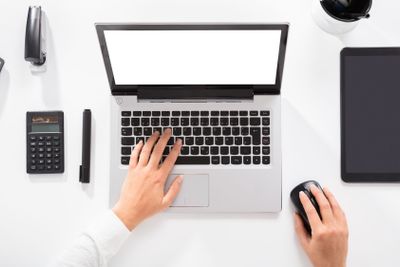 Close-up Of A Woman Working On Laptop