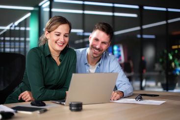 Business People Training On Computer. Young Woman