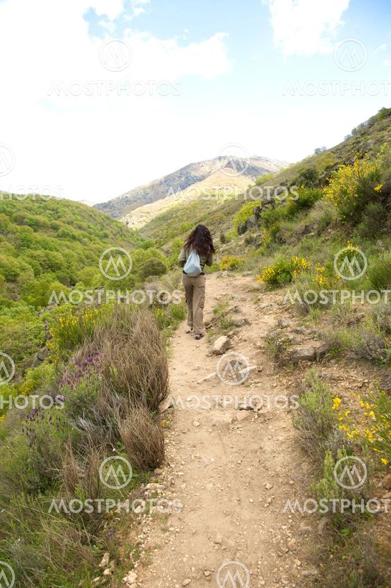 walking between green plants
