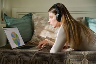 Young woman using typing working studying on laptop,...
