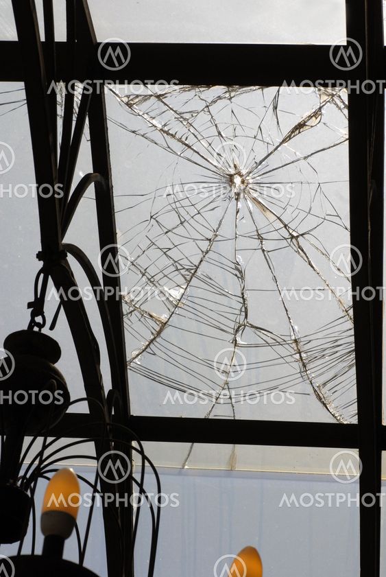 Broken glass on ceiling of porch