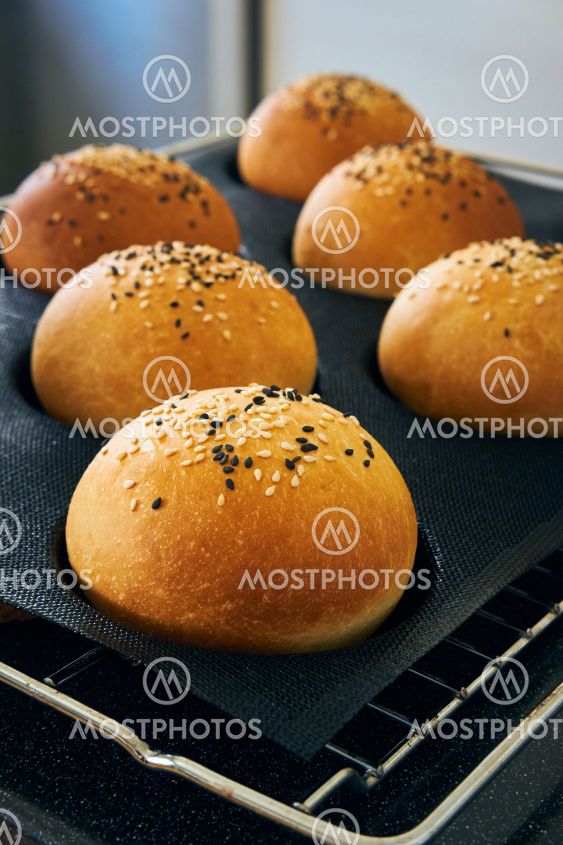 Freshly baked homemade burger buns with sesame
