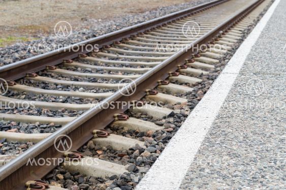 Closeup of railway track and rail platform