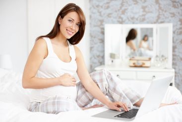 Laptop, motherhood and portrait of pregnant woman for...