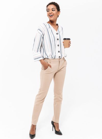 Full length portrait of a smiling young african...