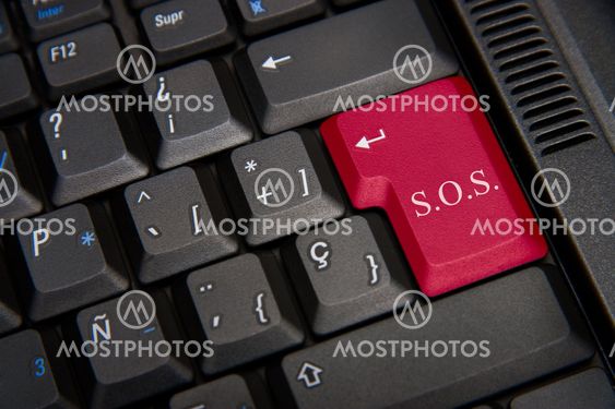 Keyboard of computer with a word SOS