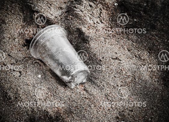 garbage plastic glass on the beach
