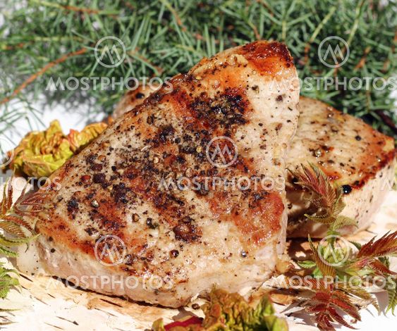 Grilled pork steaks