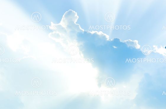 Blue sky with clouds and sunlight
